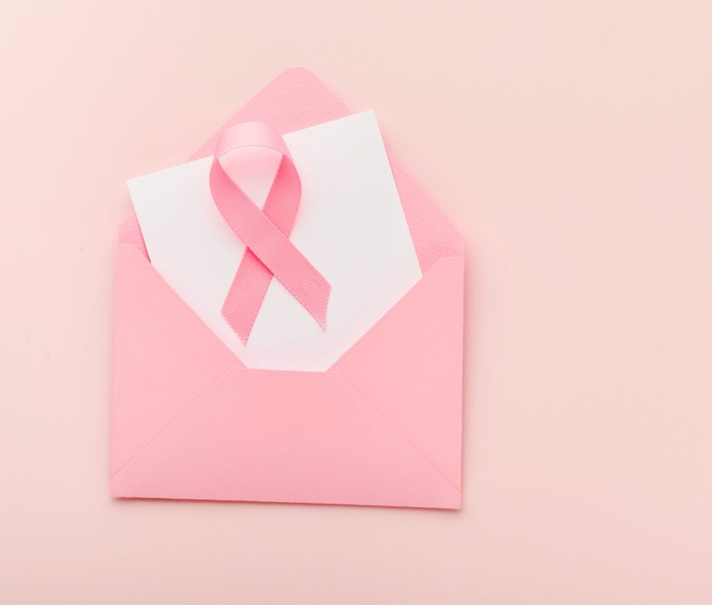 Pink,Breast,Cancer,Awareness,Ribbon.,Pink,Envelope,With,Ribbons,On