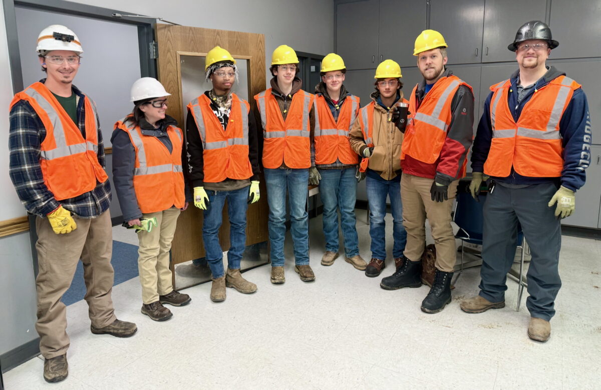 Several advanced manufacturing students toured Domtar’s Grenada Mill. From left to right: Cameron Hill, ISO Cat1 Vibration Analyst; Karen Roach, Plant Manager; students Dajuan Loston, Kylar Gibson, Fisher Jackson and Ryan Williams; Kyle Doolittle, Innovation Mentor; and Jonathan Harris, E&I Planner.