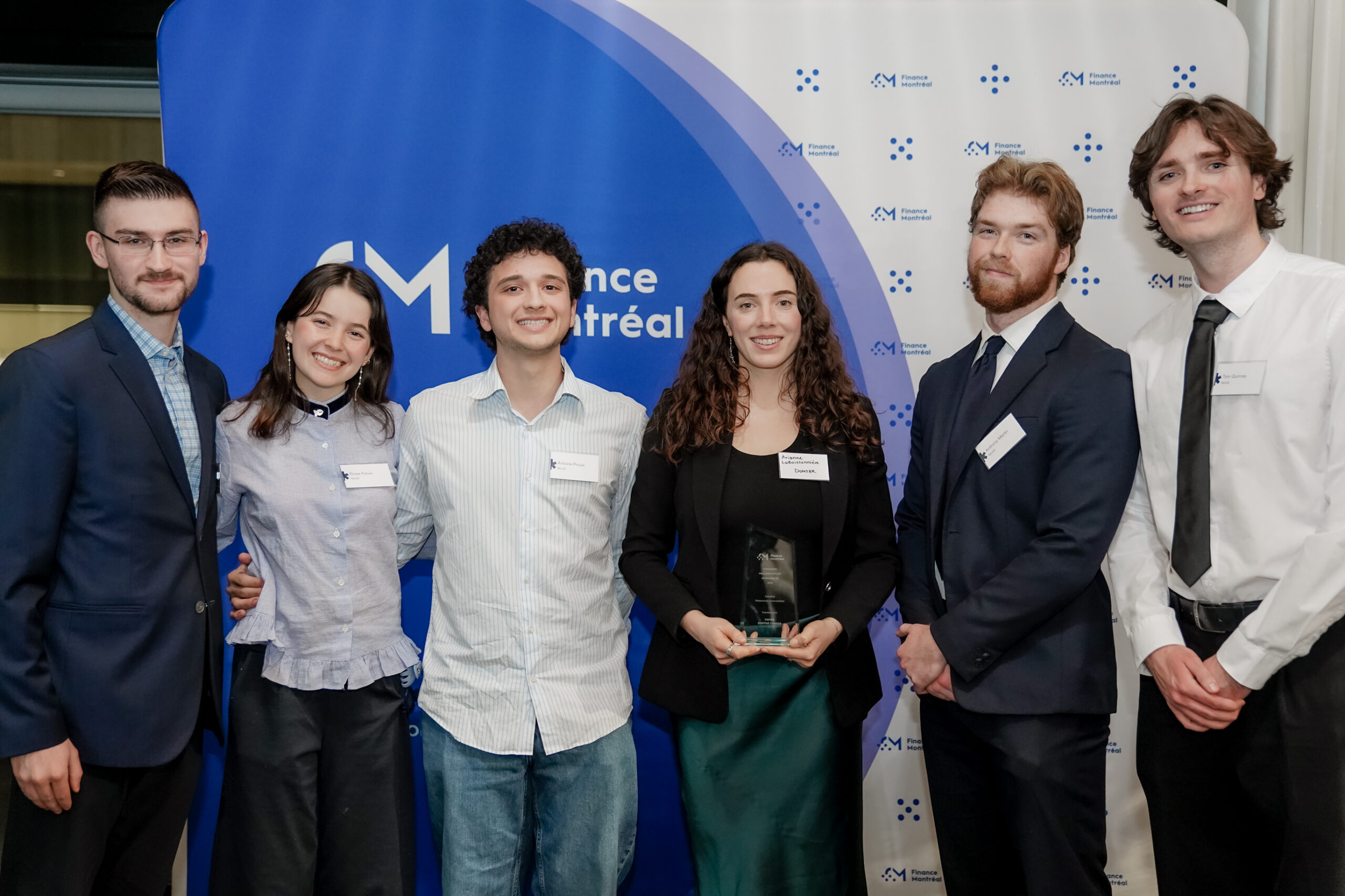 McGill students pictured with Arianne LaBoissionniere of Domtar, who accepted the third place award in the Finance Montreal Best Sustainability Report Competition in the Natural Resources category. Learn about this and other sustainability achievements on Domtar.com