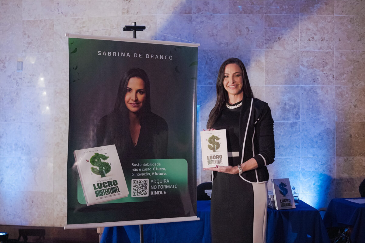 Sabrina de Branco pictured with the book she authored.