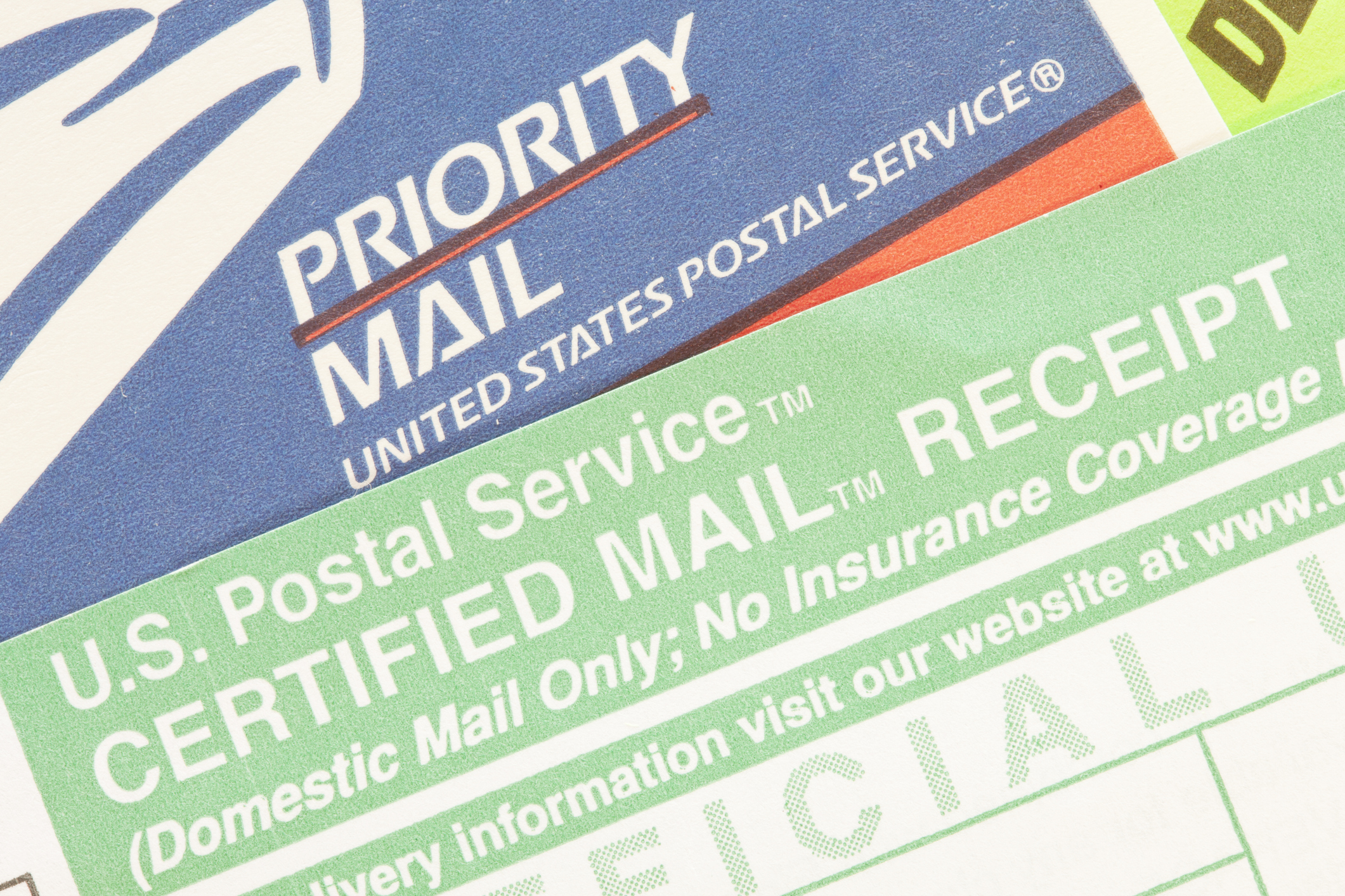 White plains, New York, USA - July 30, 2011: Postal service certified mail form and priority label sticker. The United State Postal Service is currently in trouble and closing many postal service branches across the country.