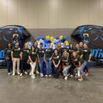 Fort Mill employees gathered to pack backpacks.