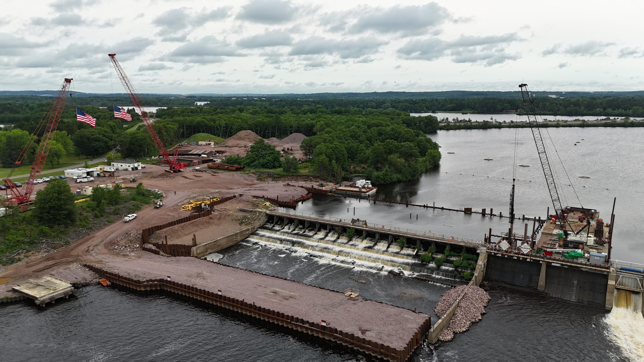 An overhead view of the Rothschild Dam modernization project in Wisconsin on a cloudy day.