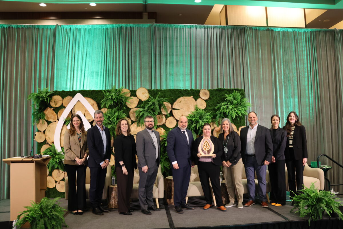 Domtar Employees on stage with the SFI award.